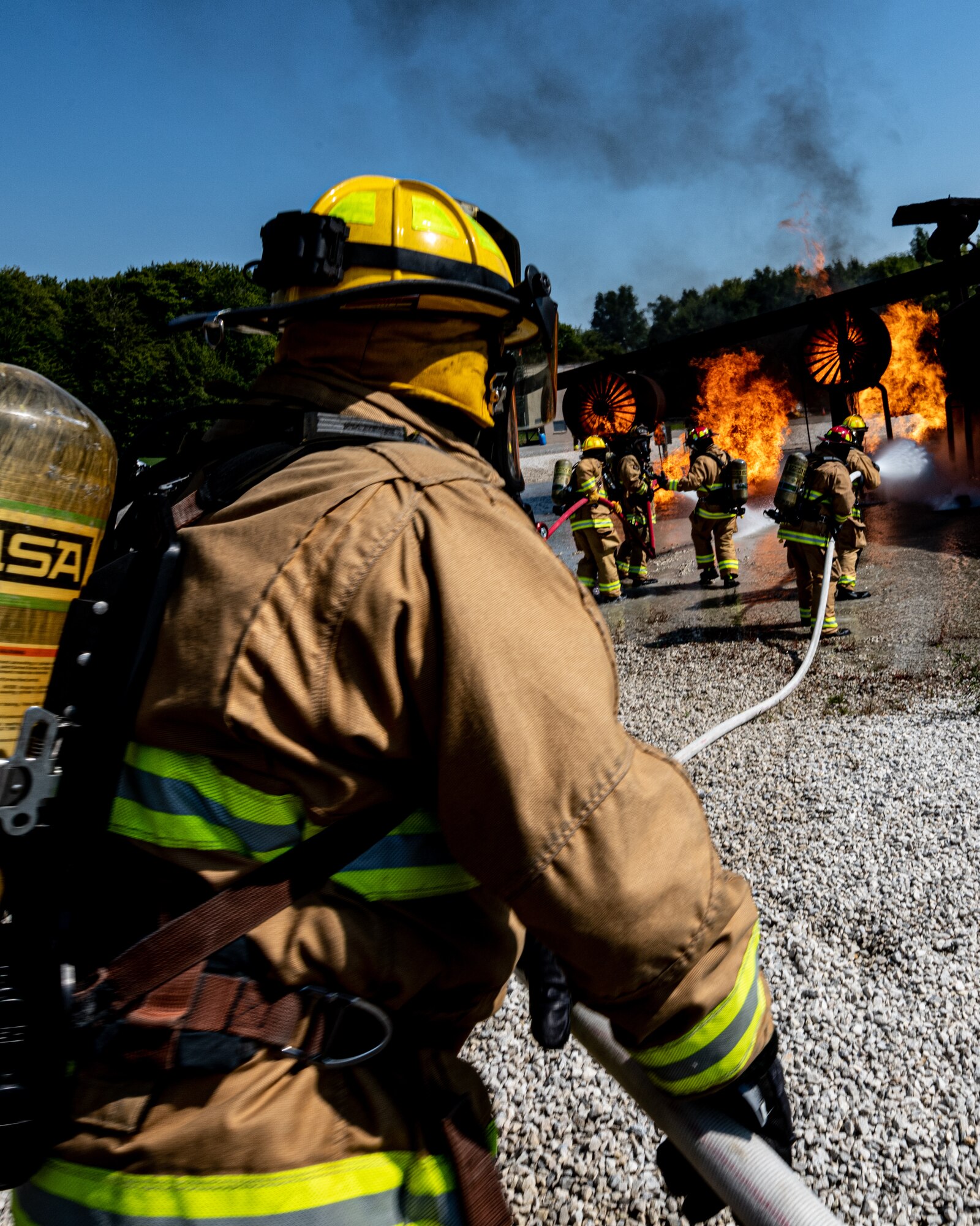 Firefighters from Rickenbacker Air National Guard fight an external aircraft fire, Sept. 9, 2020, at Youngstown Air Reserve Station’s burn pit. About 40 Citizen Airmen from RANG’s fire department came to the 910th Airlift Wing, Sept. 8-10, to do their annual live-fire training.