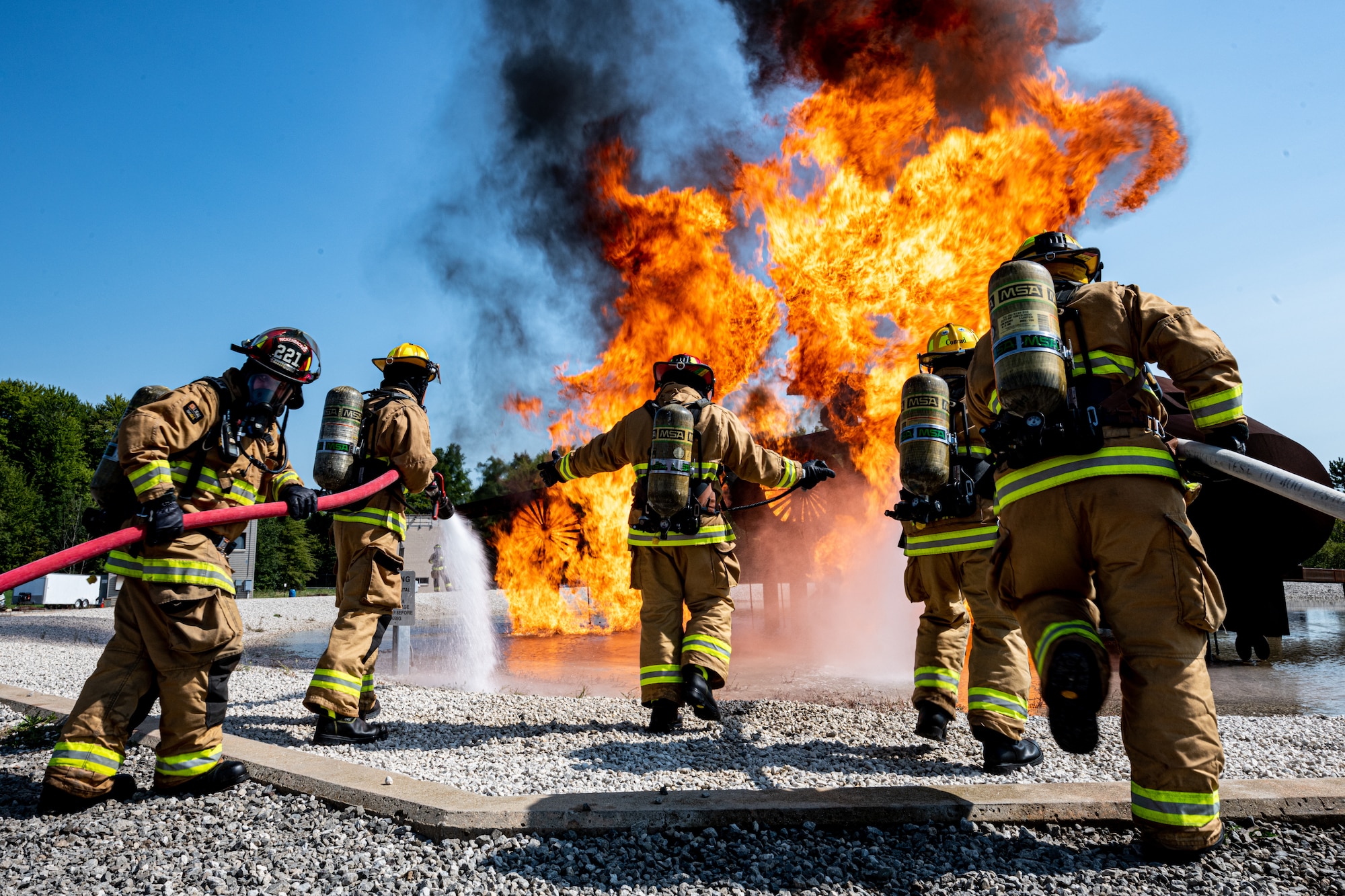 Firefighters from Rickenbacker Air National Guard fight an external aircraft fire, Sept. 9, 2020, at Youngstown Air Reserve Station’s burn pit. About 40 Citizen Airmen from RANG’s fire department came to the 910th Airlift Wing, Sept. 8-10, to do their annual live-fire training.