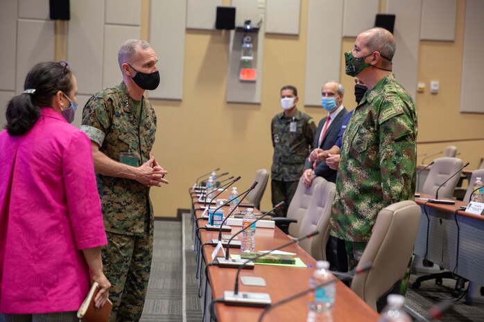 U.S. Marine Gen. Gary L. Thomas, assistant commandant of the U.S. Marine Corps, and Ambassor Jean E. Manes, civilian deputy commander of U.S. Southern Command, speak with Colombian Army Brig. Gen. Juan Carlos Correa Consuegra, director of Exercises and Coalition Affairs, SOUTHCOM, during a visit to U.S. Marine Corps Forces, South, and SOUTHCOM, in Miami, Florida, Sept. 9.