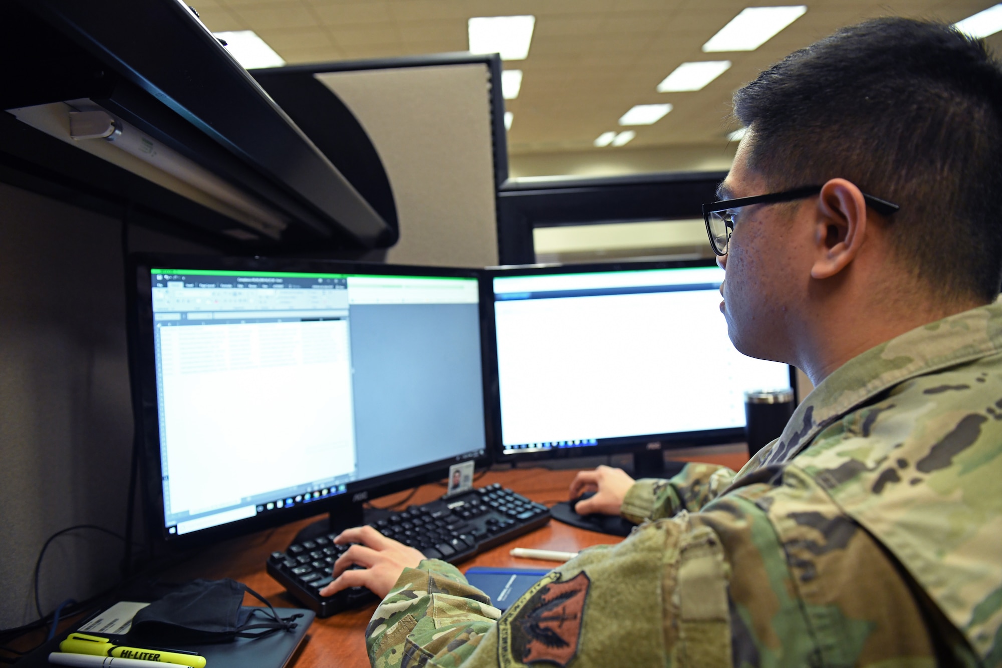 Senior Airman Joshua Baluyut, 9th Comptroller Squadron (CPTS)  financial technician, works on his computer Sep. 9, 2020, at Beale Air Force Base California. Airmen at the 9th CPTS review financial data and ensure that the 9th Reconnaissance Wing’s funds are being utilized responsibly and efficiently. (U.S. Air Force photo by Airman 1st Class Luis A. Ruiz-Vazquez)