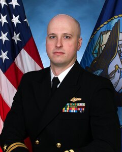 Official portrait of Lt. Joe Zeiser the assistant officer in charge of Navy Information Operations Detachment (NIOC) Groton.