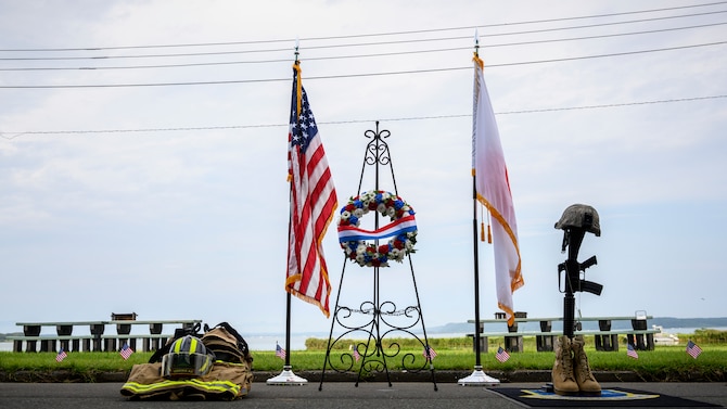 A wreath is displayed in honor of the lives lost on 9/11 at Misawa Air Base, Japan, Sept. 11, 2020. Airmen and families from across the base, including young children attended the ceremony and memorial climb in efforts to not only educate but also to ensure we never forget the sacrifices made that day. (U.S. Air Force photo by Airman 1st Class China M. Shock)