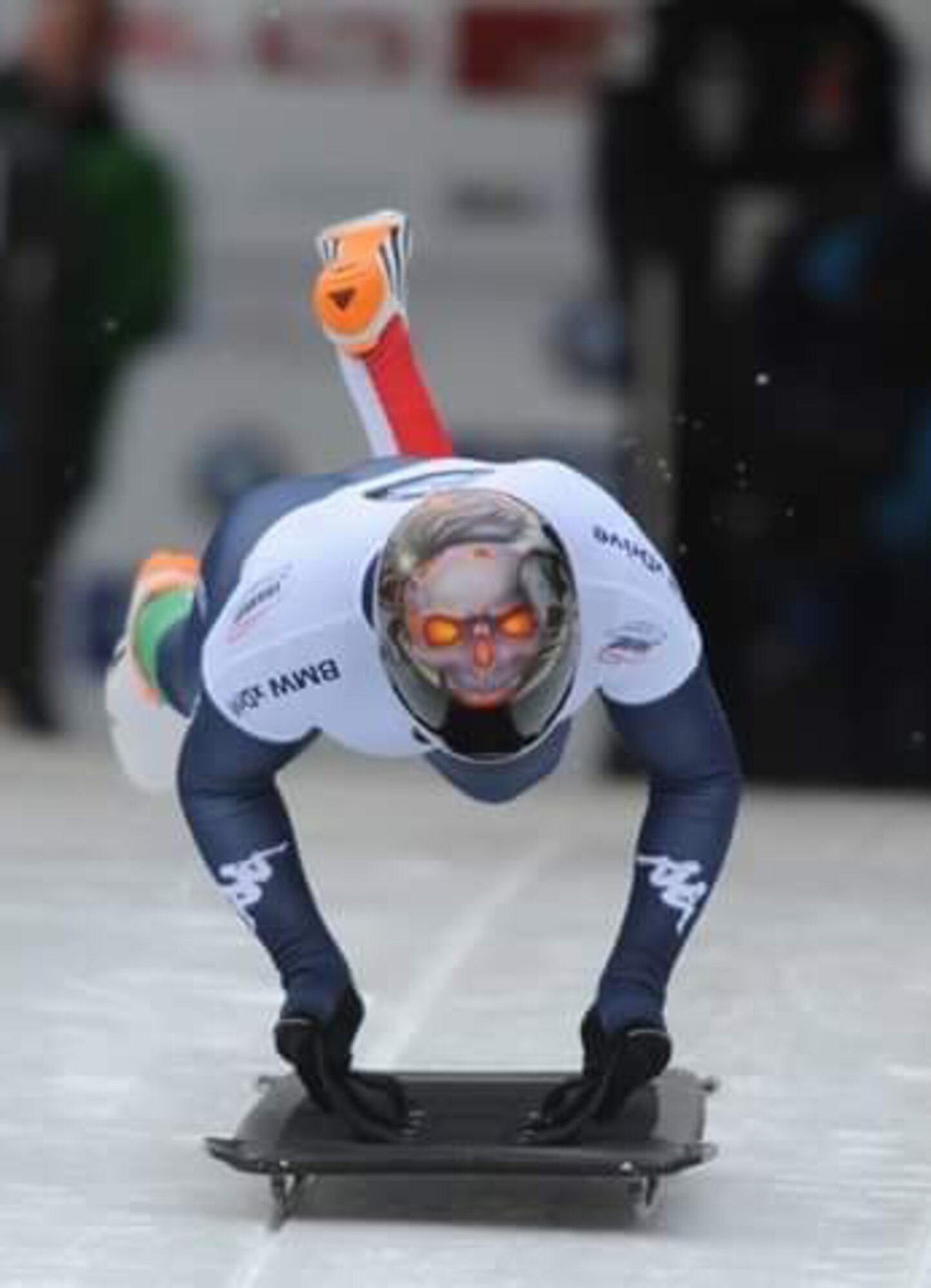 Airman 1st Class Kelly Curtis making a run down the track on her sled as a member of USA skeleton team.