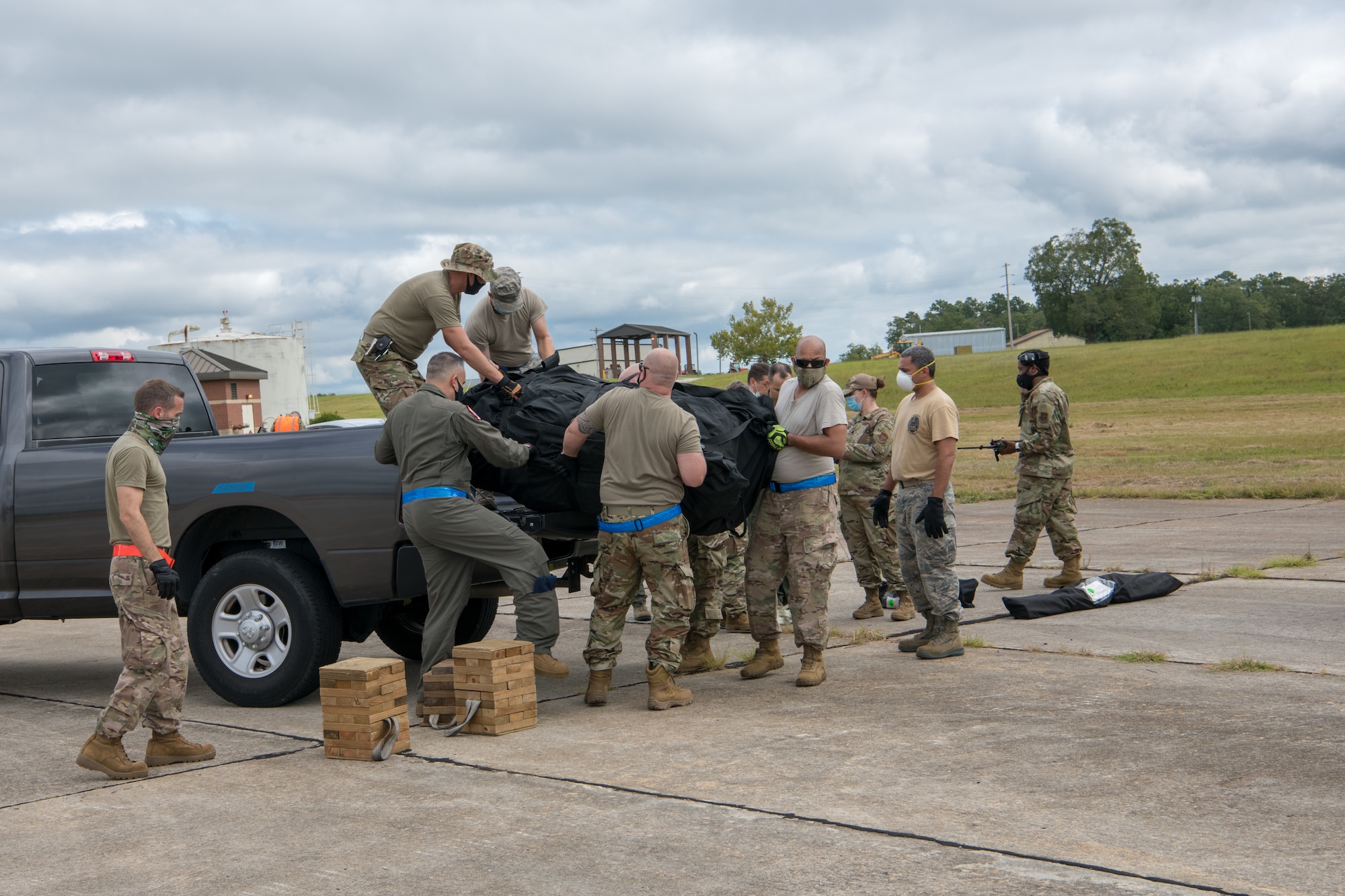 Reservists from the 315th Airlift Wing, Joint Base Charleston, S.C., unload a tent during a readiness exercise September 10, 2020 here. The exercise is in preparation for future missions and helps airmen perform their duties in a live setting.