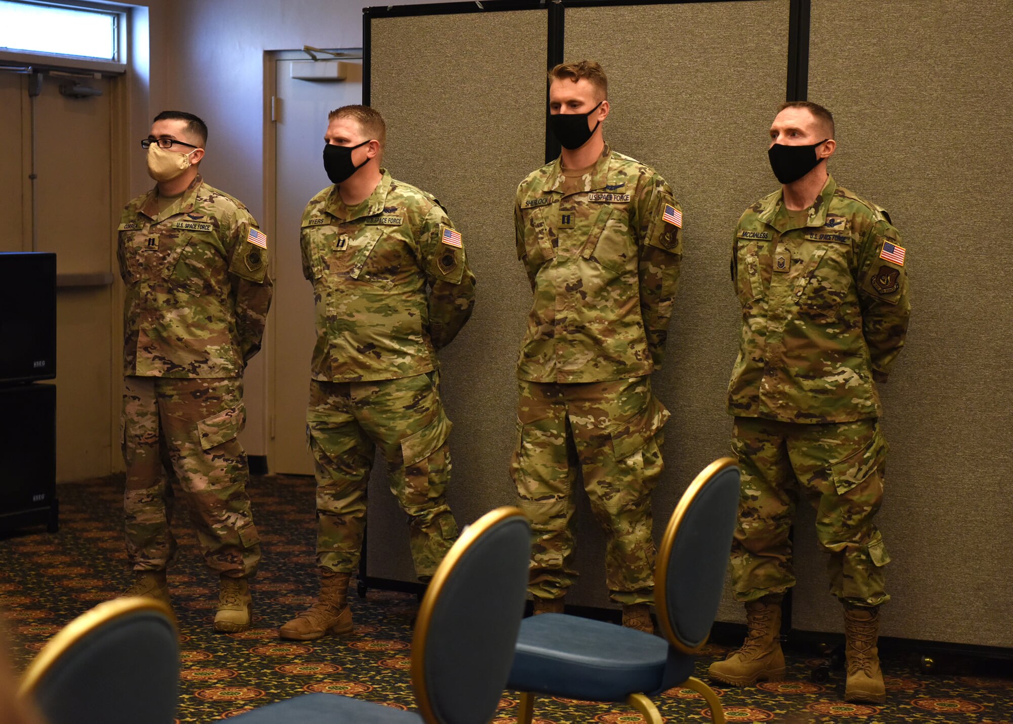 Airmen from the 18th Intelligence Squadron, Detachment 2, wait to be sworn in to the U.S. Space Force during an enlistment and commissioning ceremony on Osan Air Base, Republic of Korea, Sept. 14, 2020. These group of Airmen will be the first official members of the USSF on the Korean peninsula. (U.S. Air Force photo by Senior Airman Denise Jenson)
