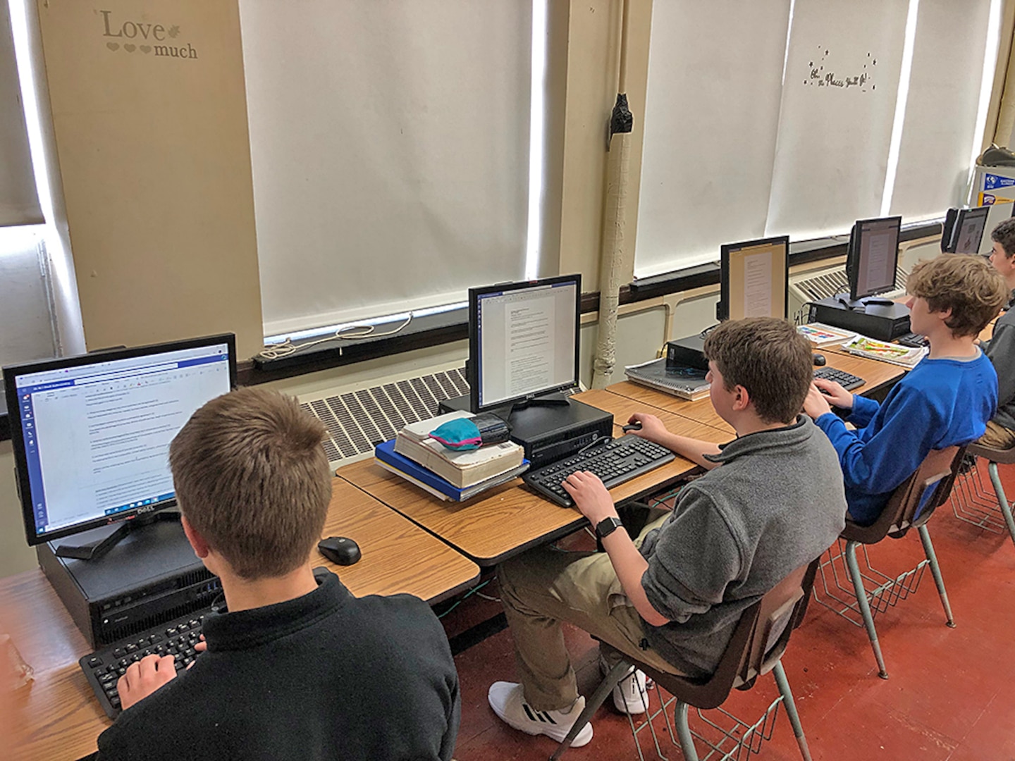 Students work on computers.