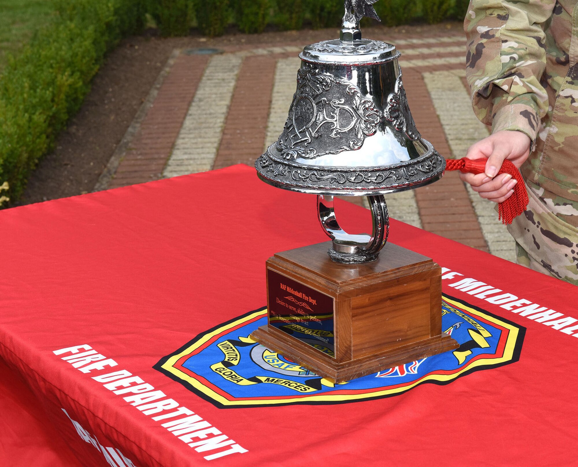 he 100th Civil Engineer Squadron Fire Department’s ceremonial bell is rung at the start of the 9/11 remembrance ceremony at Royal Air Force Mildenhall Sept. 11, 2020.