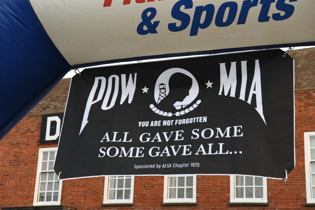 A POW/MIA flag hangs in front of the 100th Air Refueling Wing headquarters building at Royal Air Force Mildenhall, England, Sept. 11, 2020.
