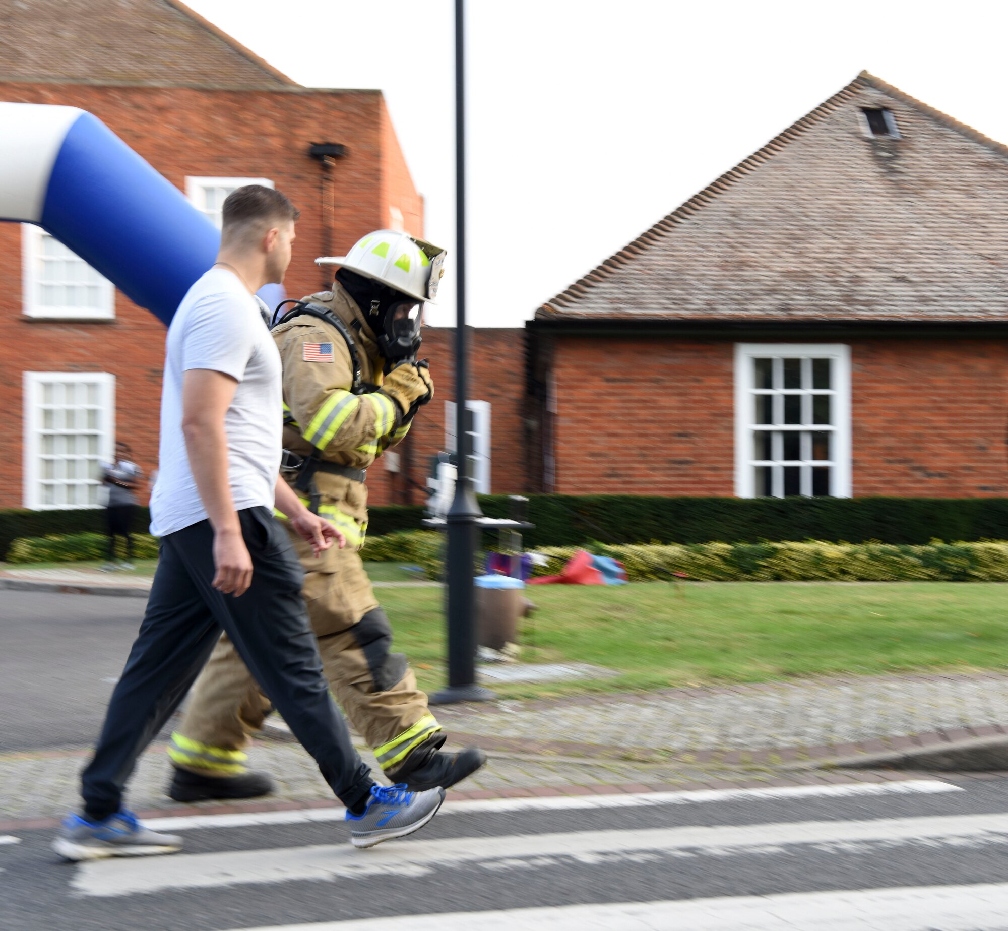 Members of Team Mildenhall walk during the 5K to remember Prisoners of war/missing in action at Royal Air Force Mildenhall, England, Sept. 11, 2020.