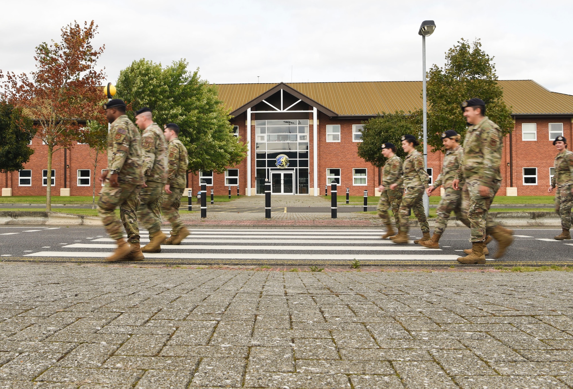 Members from the 100th Security Forces Squadron walk during the First Responder's Walk at Royal Air Force Mildenhall, England, Sept. 11, 2020.