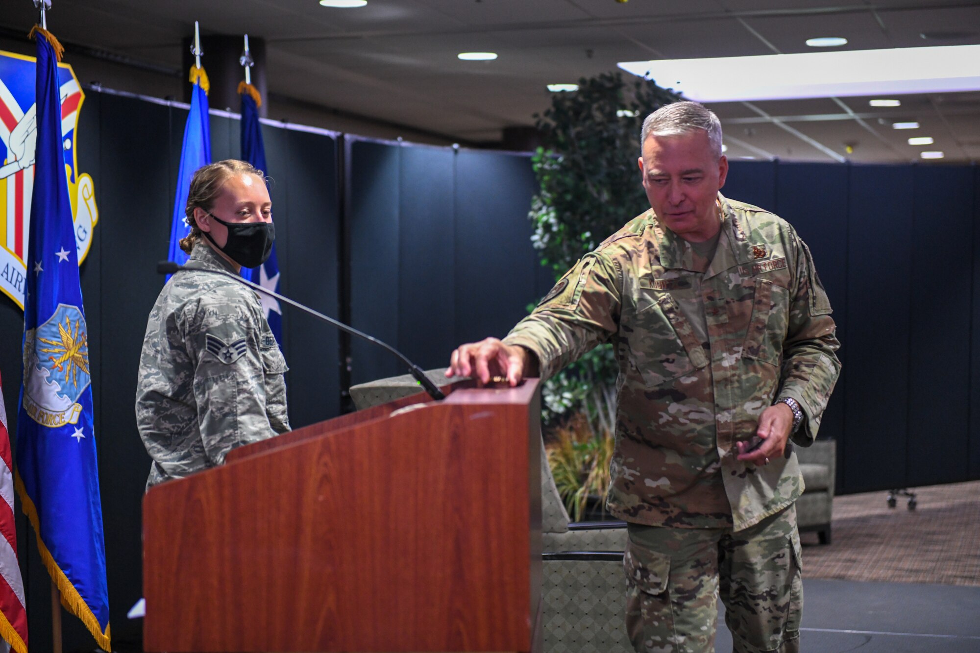 Brig. Gen. William Kountz, the director of logistics, engineering and force protection for Air Force Reserve Command, presents a coin to Senior Airman Rachael Berger, an aerial port specialist with the 76th Aerial Port Squadron, Sept. 13, 2020, Youngstown Air Reserve Station, Ohio. Berger was recognized for her exemplary service and dedication to the 910th Airlift Wing’s mission. Kountz spent the day at YARS visiting different squadrons to learn about their missions and get a better understanding of how AFRC could help contribute.