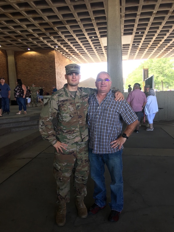 Spc. Michael Lane (left) and 1st Sgt. Richard Lane (right) pose for a photo at the Call to Duty ceremony for 1st Battalion, 145th Armor Regiment on Aug. 26th 2019.  It would be just over a year before father and son would reunite in theater on overlapping assignments.