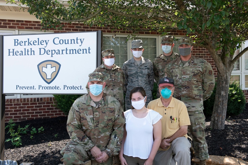 People pose for a group photo.