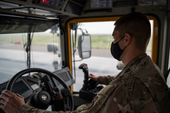 97th Civil Engineer Squadron removes runway rubber.