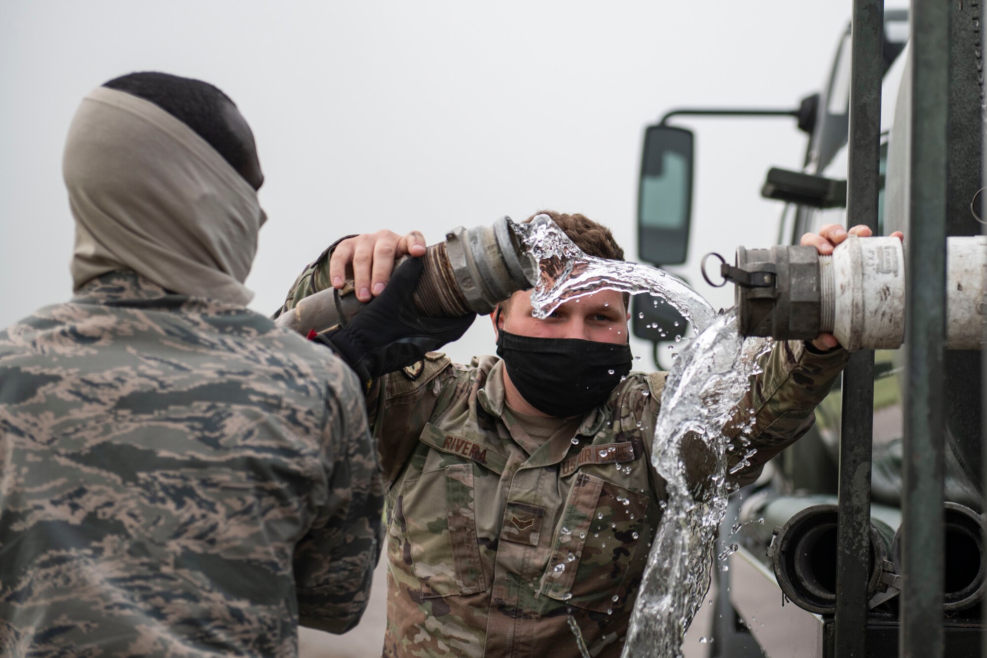 97th Civil Engineer Squadron removes runway rubber.