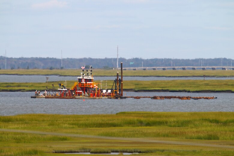 The Dredge Fullerton, owned and operated by Barnegat Bay Dredging Company, conducts dredging in the New Jersey Intracoastal Waterway near Stone Harbor, NJ in September 2020. Sediment is being pumped onto Gull Island and Sturgeon Islands, two low lying marsh islands.