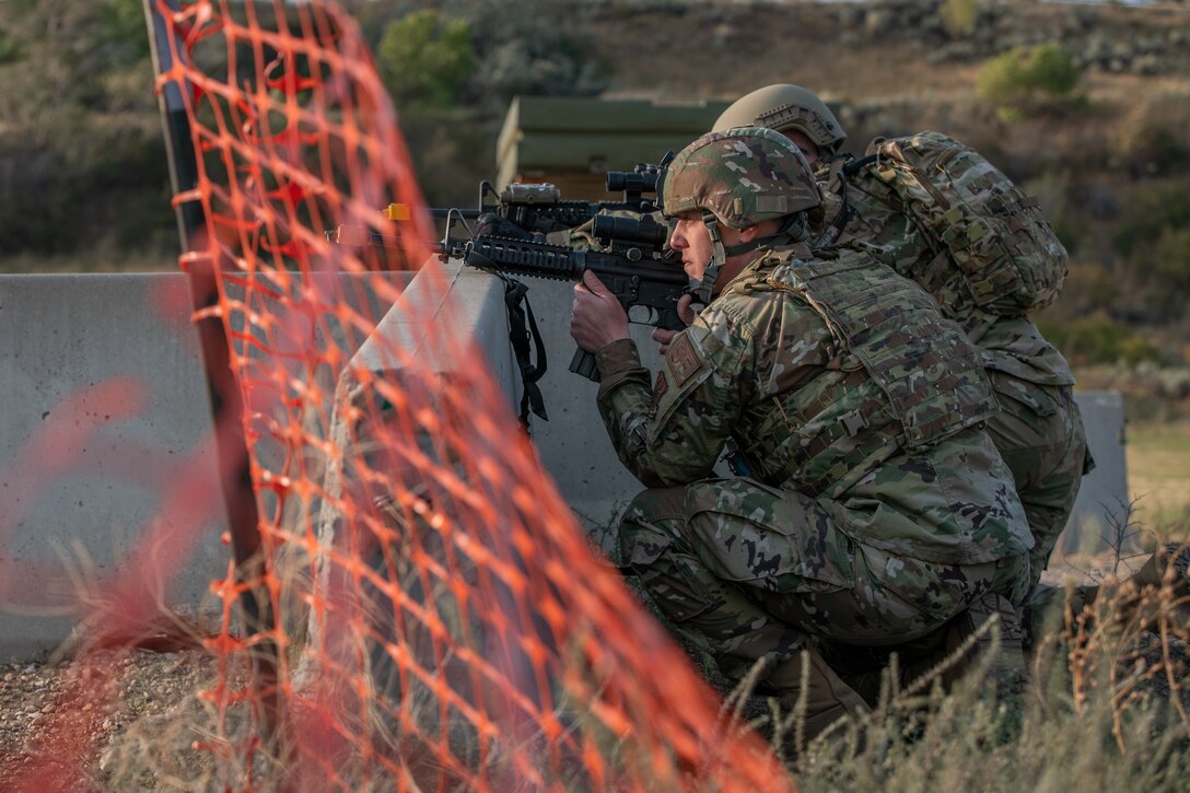 Reservists from the 419th Security Forces Squadron posts at a barrier during an exercise Sept. 13, 2020, at Hill Air Force Base, Utah.