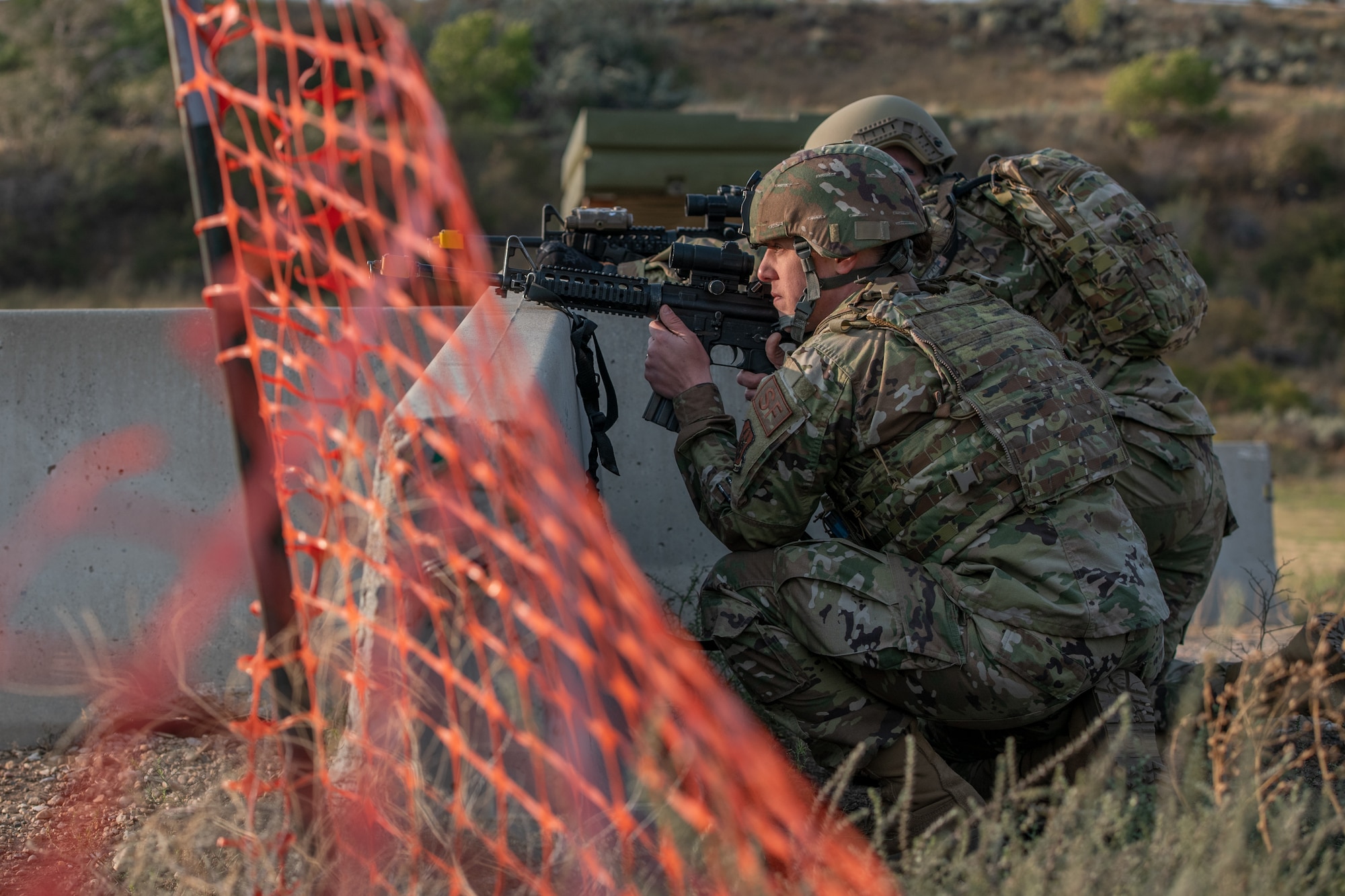 Reservists from the 419th Security Forces Squadron posts at a barrier during an exercise Sept. 13, 2020, at Hill Air Force Base, Utah.