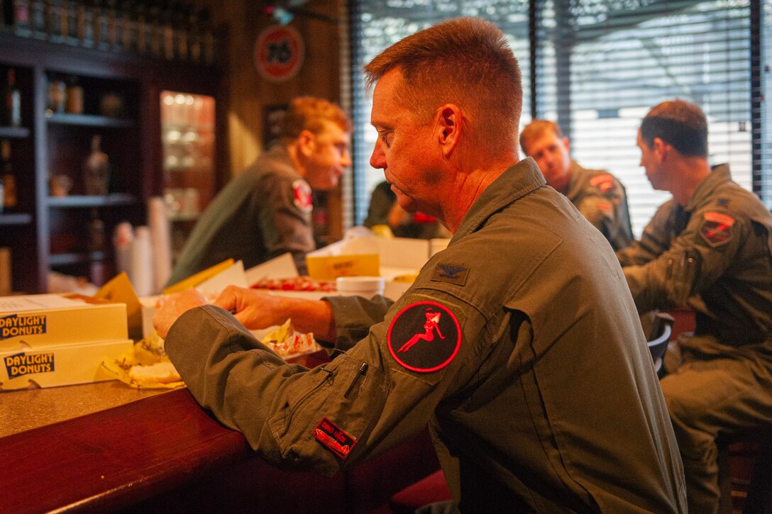 Photo of Col. Schultz eating breakfast