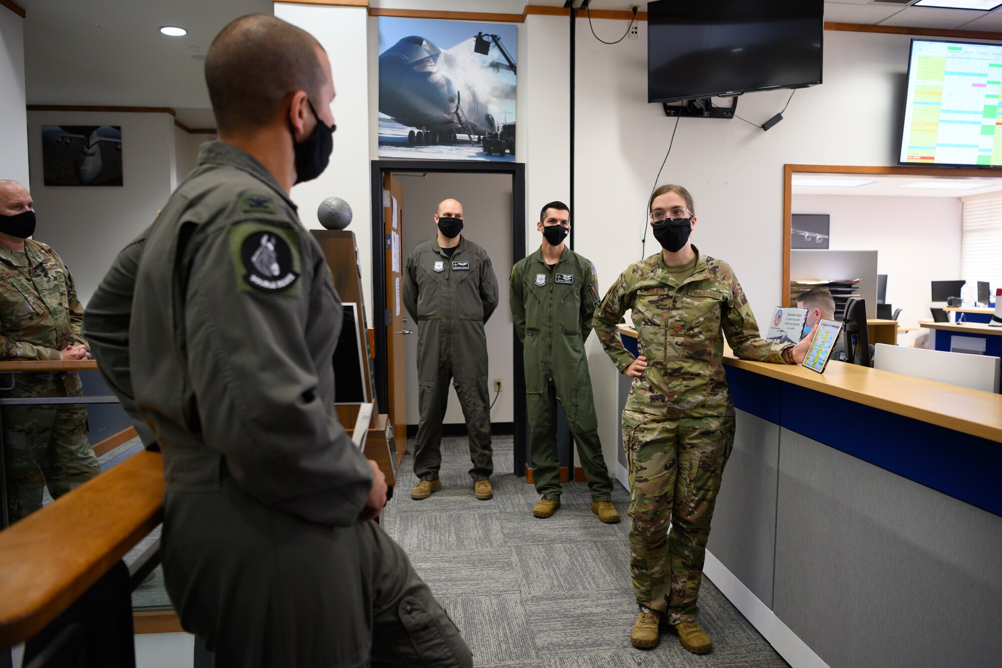 Airman gives briefing to leadership