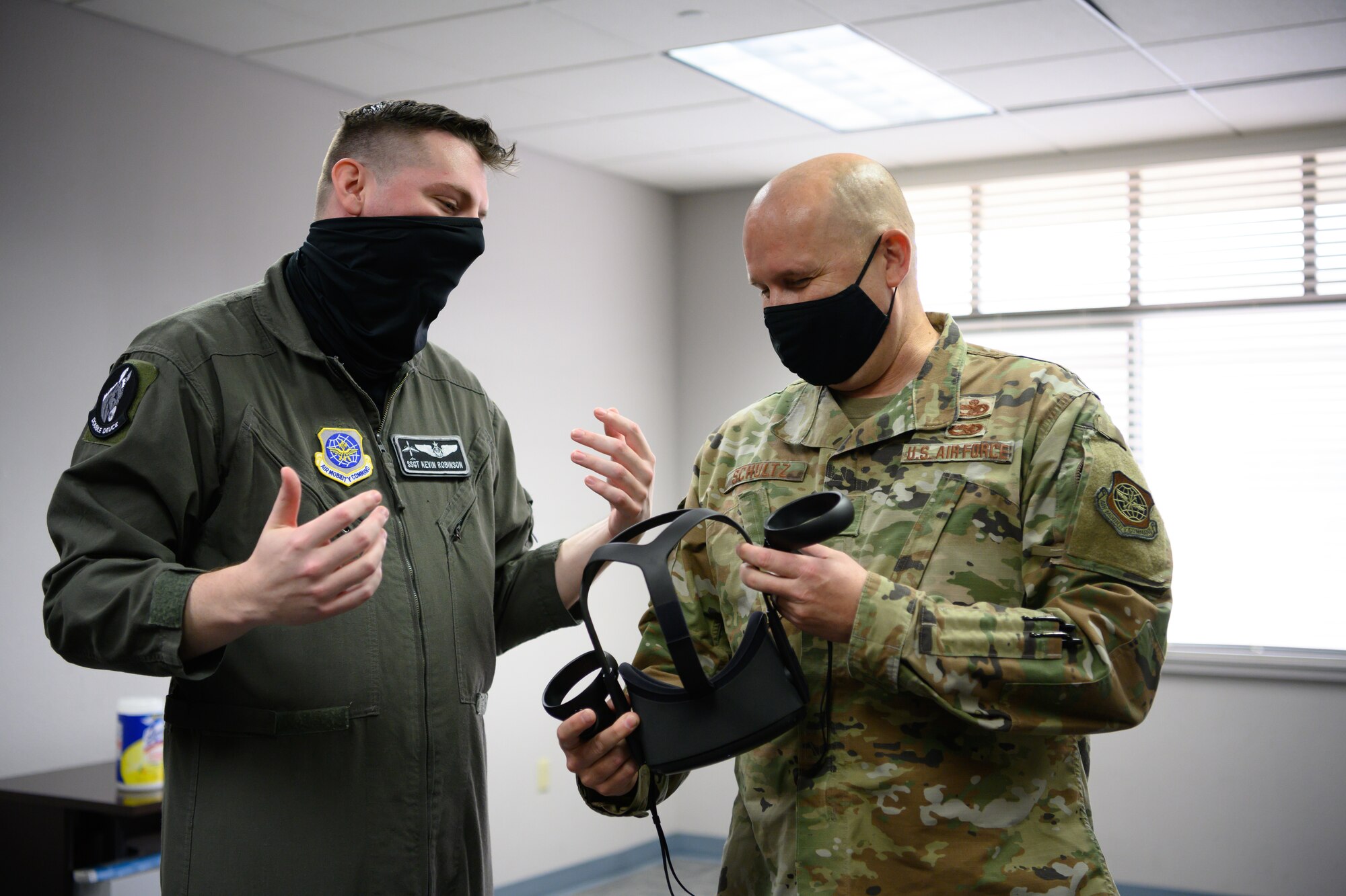 Airman shows chief virtual reality headset.