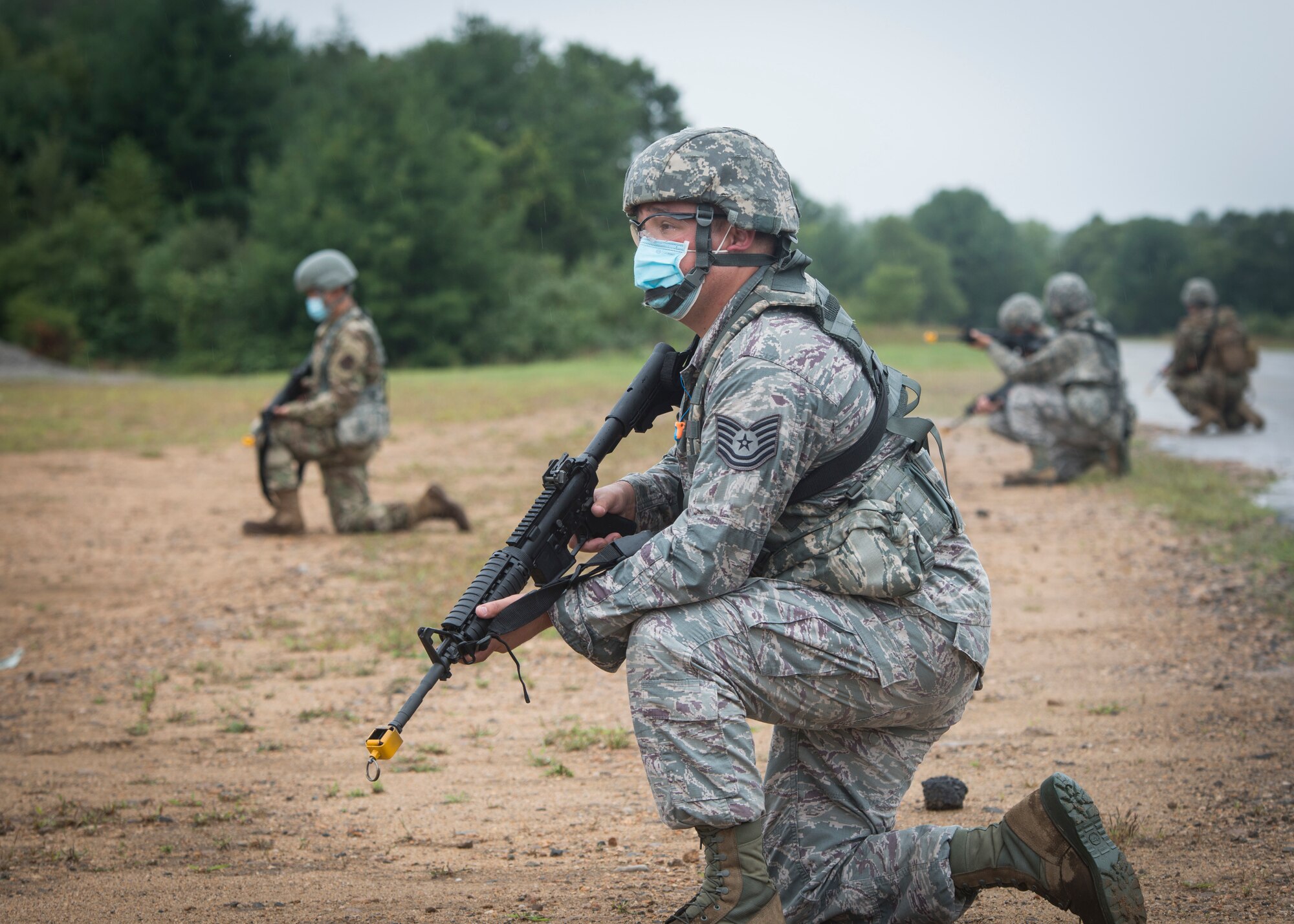 Connecticut National Guard Airmen from the 103rd Civil Engineer Squadron protect a convoy during expeditionary operations training at Stones Ranch Military Reservation in East Lyme, Connecticut, Sept. 10, 2020. Members of the 103rd Civil Engineer Squadron, 103rd Security Forces Squadron, 103rd Logistics Readiness Squadron, and 103rd Medical Group combined their expertise to conduct this key readiness training while protecting the health of participants.