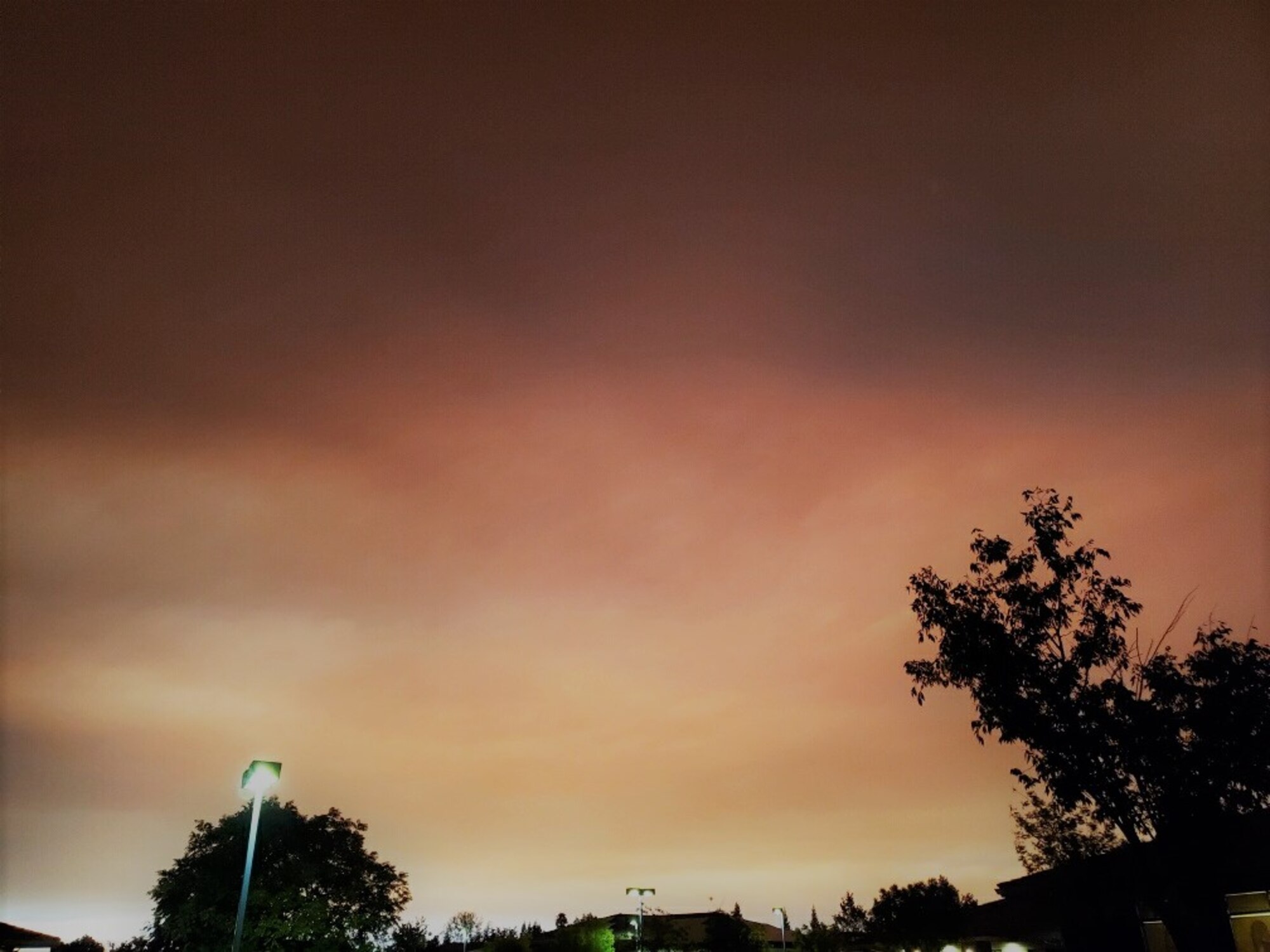 Northwest view of sky from the 940th ARW headquarter's building as the smoke thickens from the neighboring Elkhorn and August Complex Wildfires.