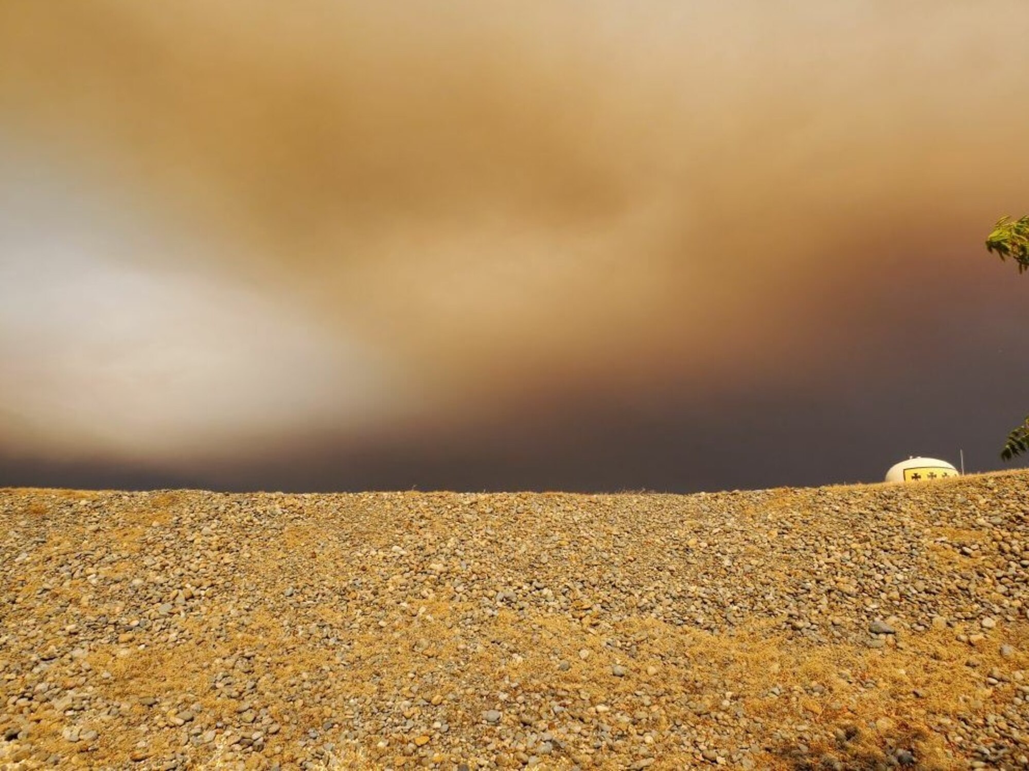 Northern view of sky from the 940th ARW headquarter's building during the second week of September from multiple fires burning in the north part of the state.