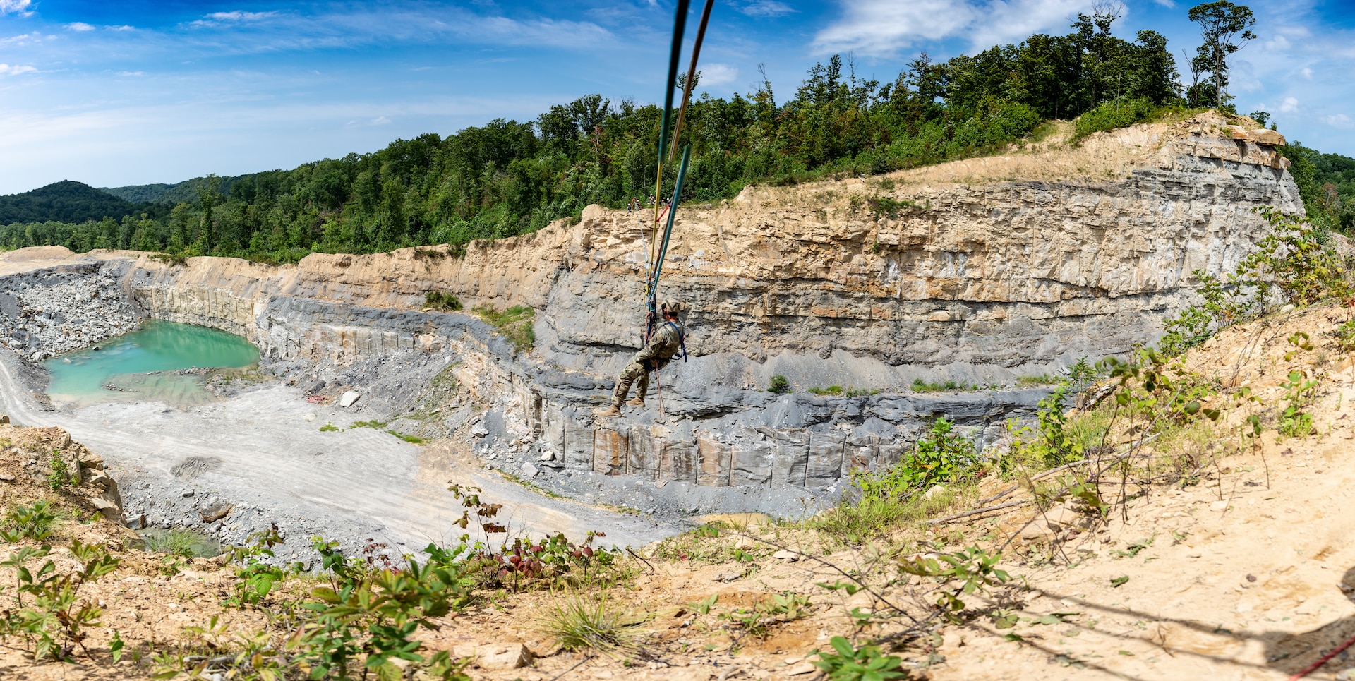 Members of the West Virginia National Guard Army Interagency Training Education Center (AITEC) participate in a rope rescue course at the Hobet mine site in Madison, West Virginia. The week-long course trains soldiers on proper rope rescue techniques including repelling, ascending, and high rope rescue, leading to nationally recognized rescue technician certifications.  

(West Virginia National Guard photo by Edwin L. “Bo” Wriston)