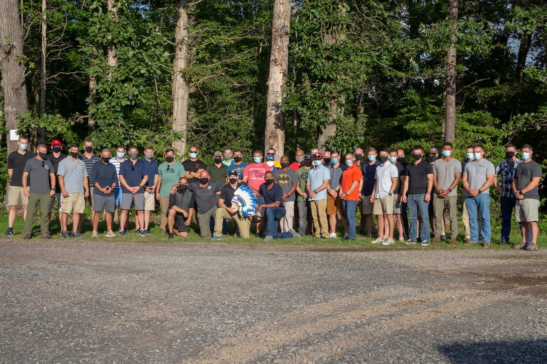 The 19th Sergeant Major of the Marine Corps, Sgt. Maj. Troy E. Black, poses for photo with Marines from 2nd Battalion, 6th Marine Regiment at a unit event in Chancellorsville V.A., Sept. 10, 2020. The purpose of the visit was to discuss leadership during times of war. The Marines of 2/6 are preparing for a deployment come 2021. (U.S. Marine Corps photo by Sgt. Victoria Ross)