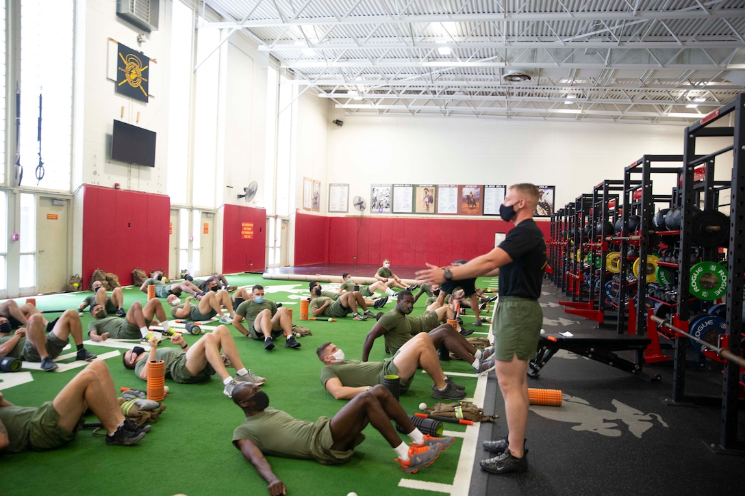 The 19th Sergeant Major of the Marine Corps, Sgt. Maj. Troy E. Black, observes training at The Basic School (TBS) Fitness Center at Marine Corps Base Quantico, V.A., Sept. 10, 2020. The purpose of the visit was to look at the Officer Candidate training facilities and speak to the instructors responsible for facilitating countless hours of training. The Fitness Center housed at TBS includes the only Force Fitness Instructor certifying course in the Marine Corps. (U.S. Marine Corps photo by Sgt. Victoria Ross)
