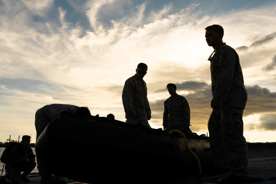 U.S. Marines assemble an F470 Combat Rubber Raiding Craft during a training event at White Beach, Okinawa, Japan, Sept. 15.