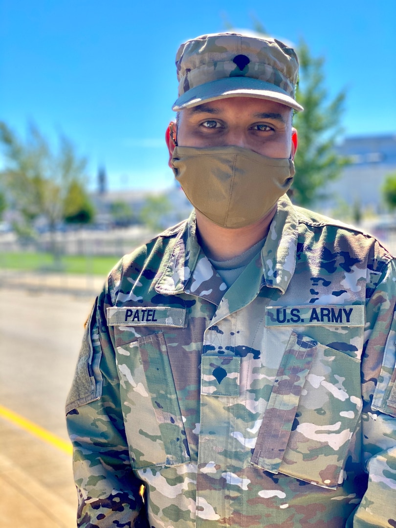 Kentucky National Guard Spc. Jayendra Patel takes a moment while working for his unit in Louisville during the Kentucky Derby, Sept. 5, 2020. While stranded in his hometown in India during the COVID-19 pandemic, he used his experience as a culinary specialist to feed hundreds of people.
