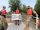 Dane Morris, Project Manager, explains damages to Tadpole Chute on the Missouri River to Maj. Gen. William H. Graham, Jr. and Stu Cook, Chief of the Operations Division, Kansas City District during a site visit on the Missouri River near Columbia, Mo. on September 15, 2020. Photo by Justin Hughes