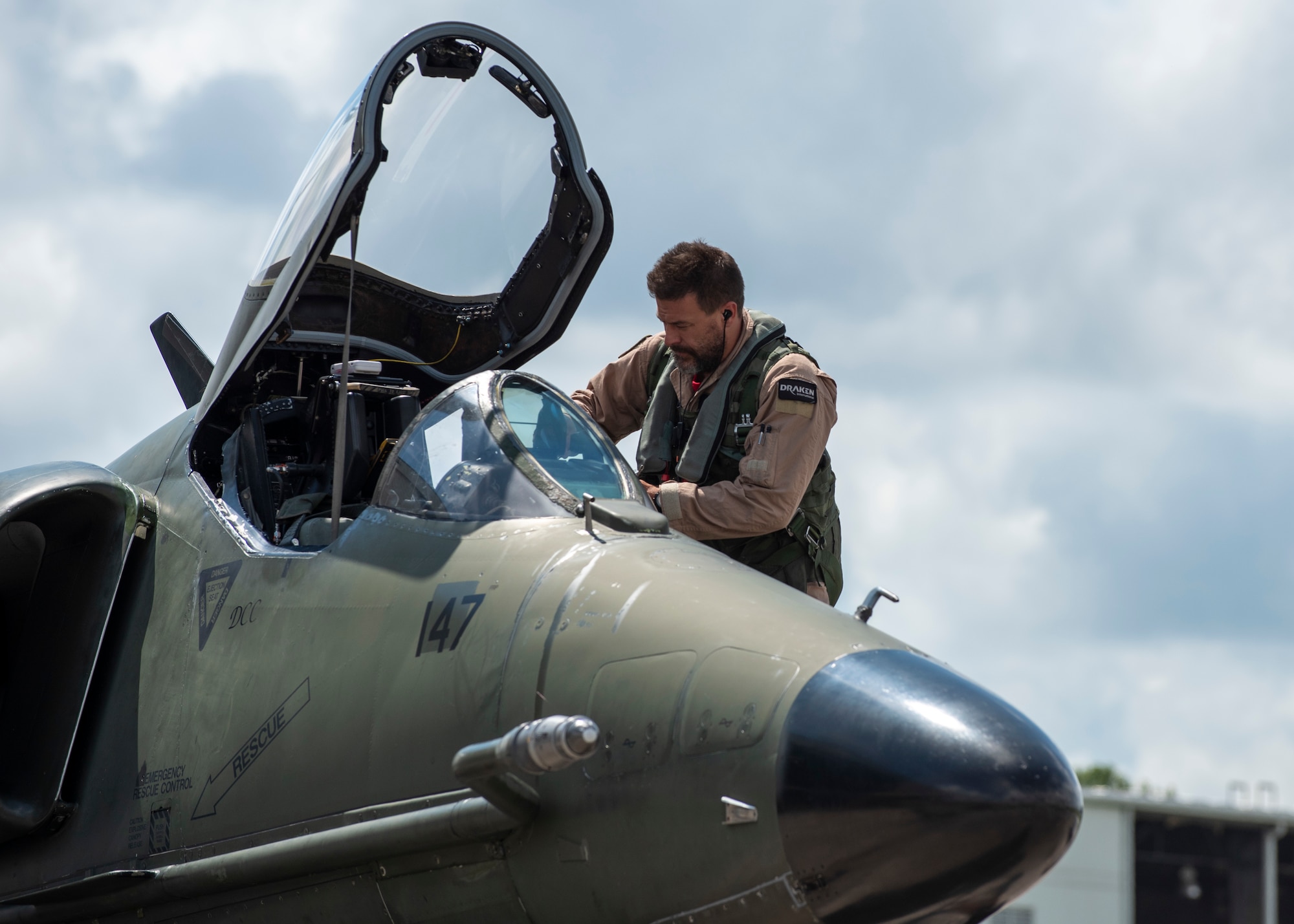 Greg Cloer, Draken International pilot, prepares to fly a A-K4 Skyhawk at Kinston Regional Jetport, North Carolina, Sept. 11, 2020. Draken provided a realistic aerial training environment to F-15E Strike Eagle aircrew members at Seymour Johnson Air Force Base. (U.S. Air Force photo by Airman 1st Class Kimberly Barrera)