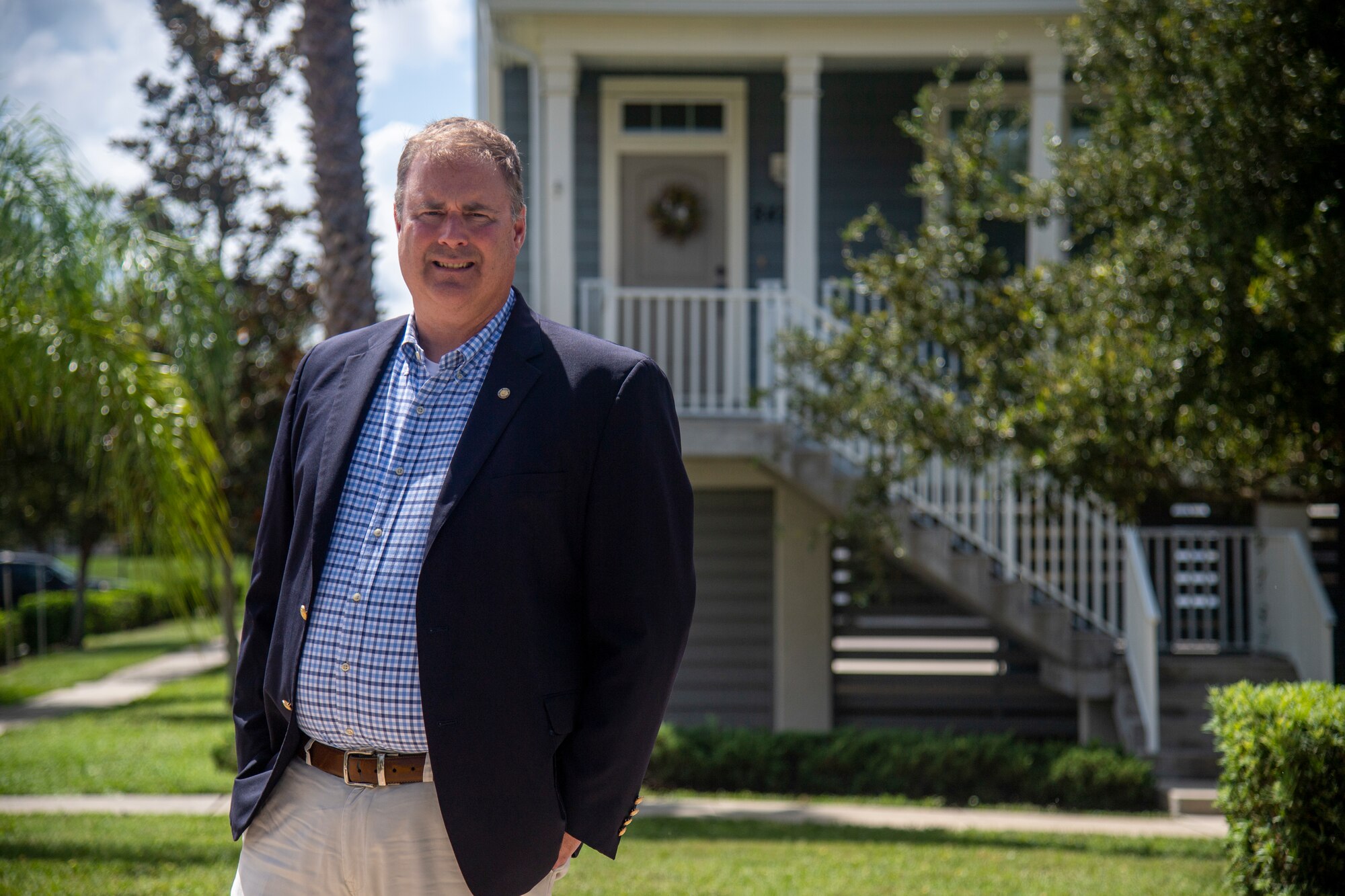 William Farnand, 6th Air Refueling Wing resident advocate, stands in front of base housing at MacDill Air Force Base, Florida, Sept. 16, 2020. Farnand is the liaison between privatized housing residents, military housing authorities, including the installation commander and the privatized housing project owner, for issues pertaining to privatized housing residents rights and advocacy. (U.S. Air Force photo by Staff Sgt. Adam Shanks)