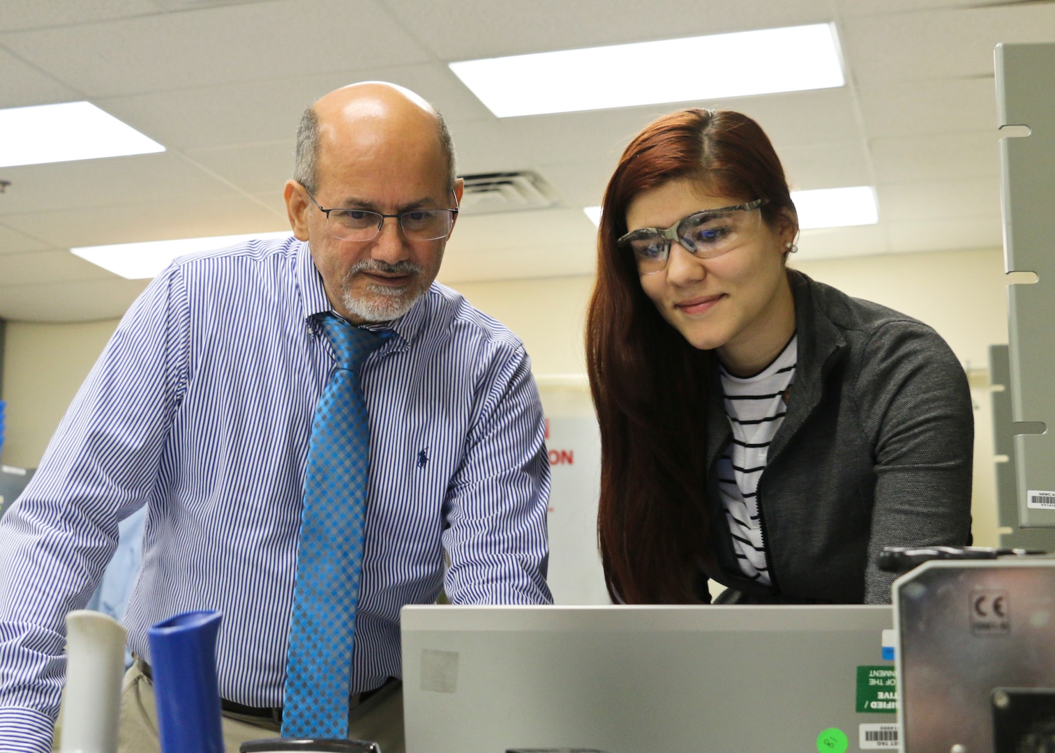 NSWC Philadelphia Division Wastewater In-Service Engineering branch head Ramon “Tony” Morales mentoring Gabriella Gonzalez Pascual while she was a coop intern in 2018 after Hurricane Maria swept through Puerto Rico. Morales’ mentorship has lead Gonzalez Pascual to become a full time NSWC Philadelphia Division employee. (U.S. Navy Photo by Keegan Rammel)