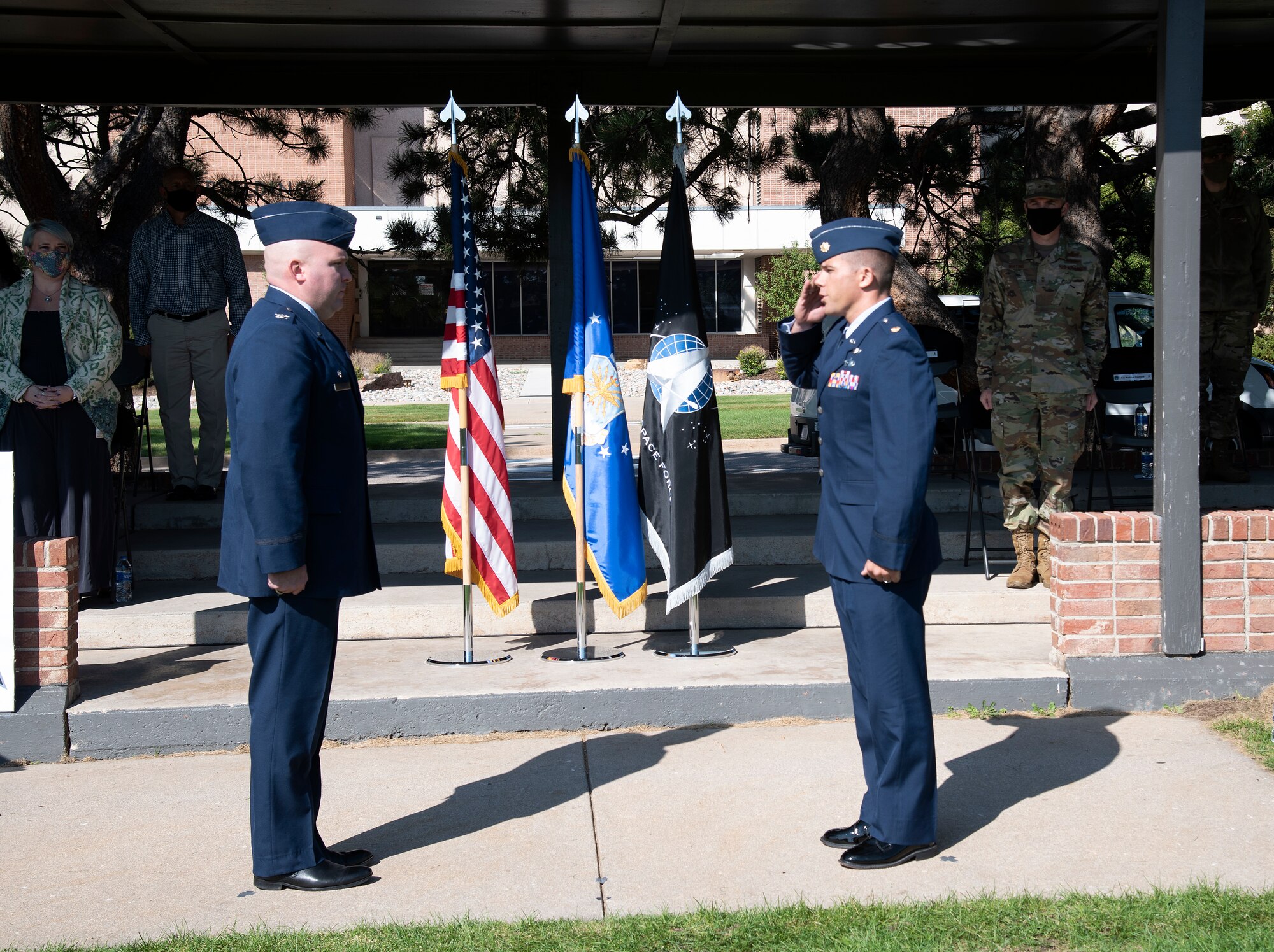 71st ISRS commander saluting Delta 7 commander