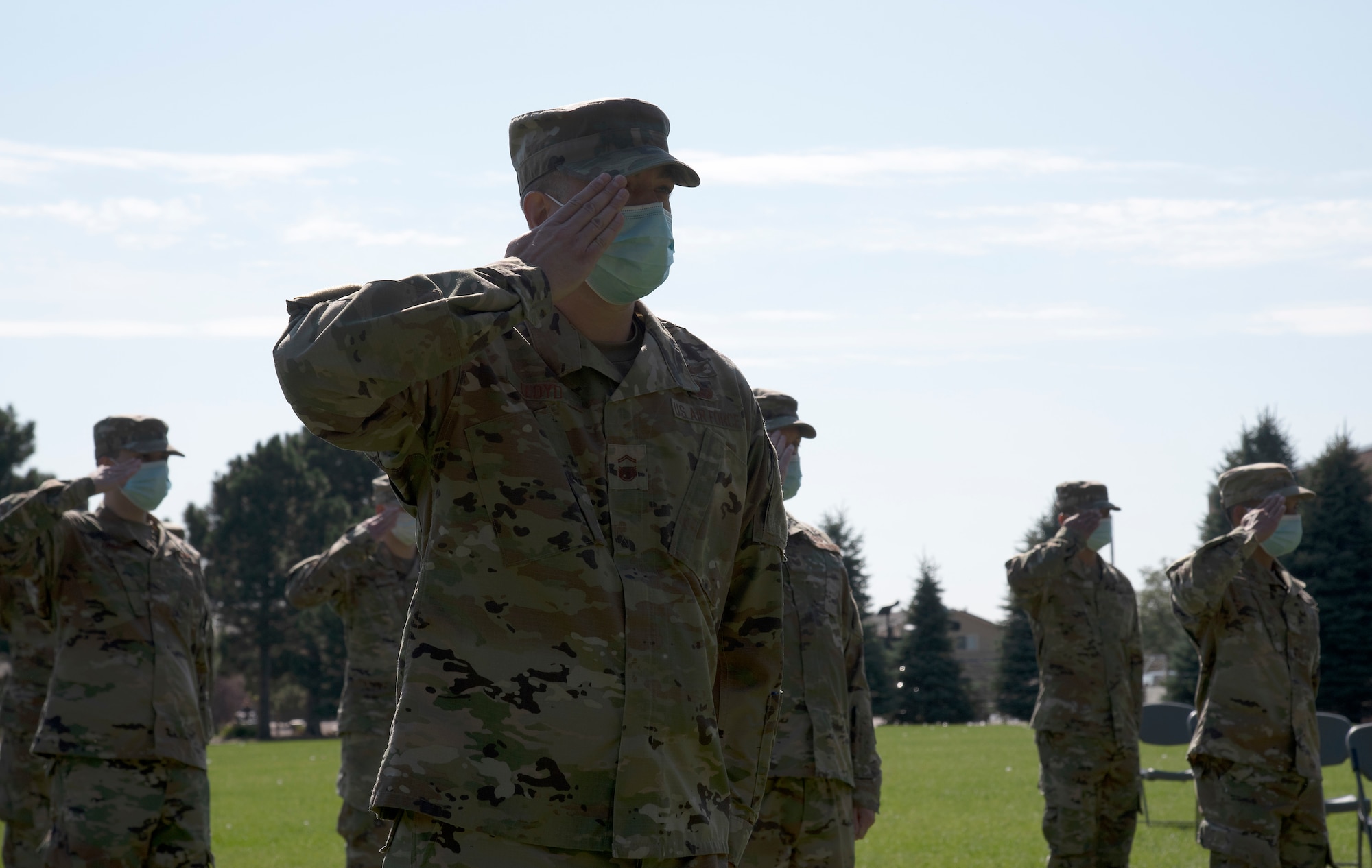 Group of Airmen saluting