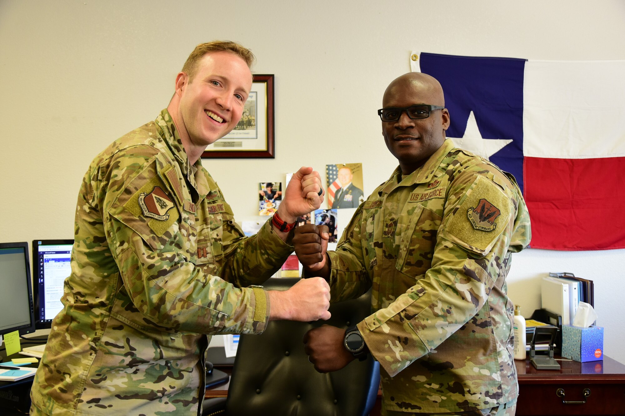 A photo of two Airmen.