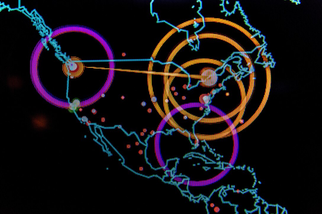 A graphic, computer-generated line map of the world highlights points of cyber activity.