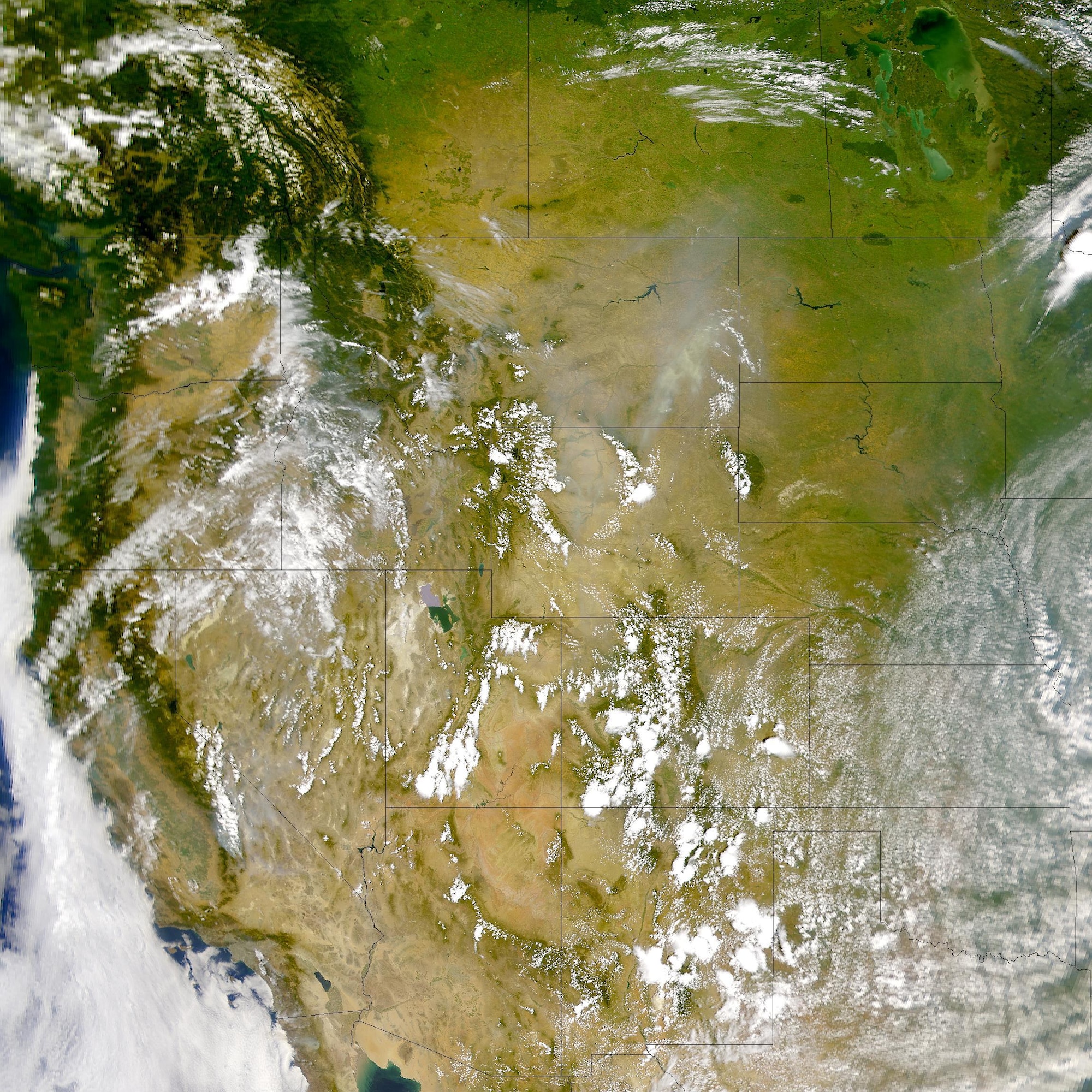 A colorized satellite image shows the western part of the United States.