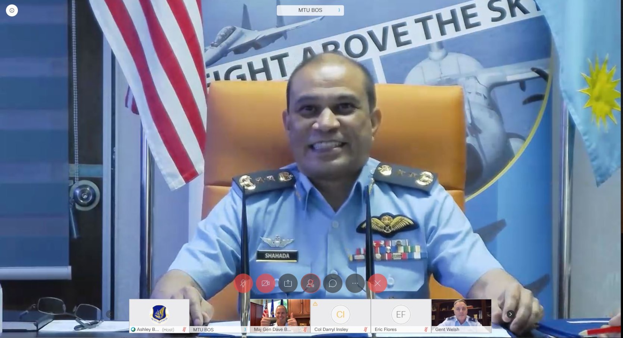 Royal Malaysian air force Maj. Gen. Mohd Shahada bin Ismail, Assistant Chief of Staff for Operation and Strategy Department at RMAF Headquarters, Kuala Lumpur (top middle) delivers his closing remarks during a virtual Airman-to-Airman Talks (A2AT) engagement September 14, 2020. The two air forces have participated in a number of engagements and exercises together since the early 1980s, the most recent being Exercise Cope Taufan 18 and the Langkawi International Maritime and Aerospace Exhibition 2019. (U.S. Air Force photo by Staff Sgt. Hailey Haux)