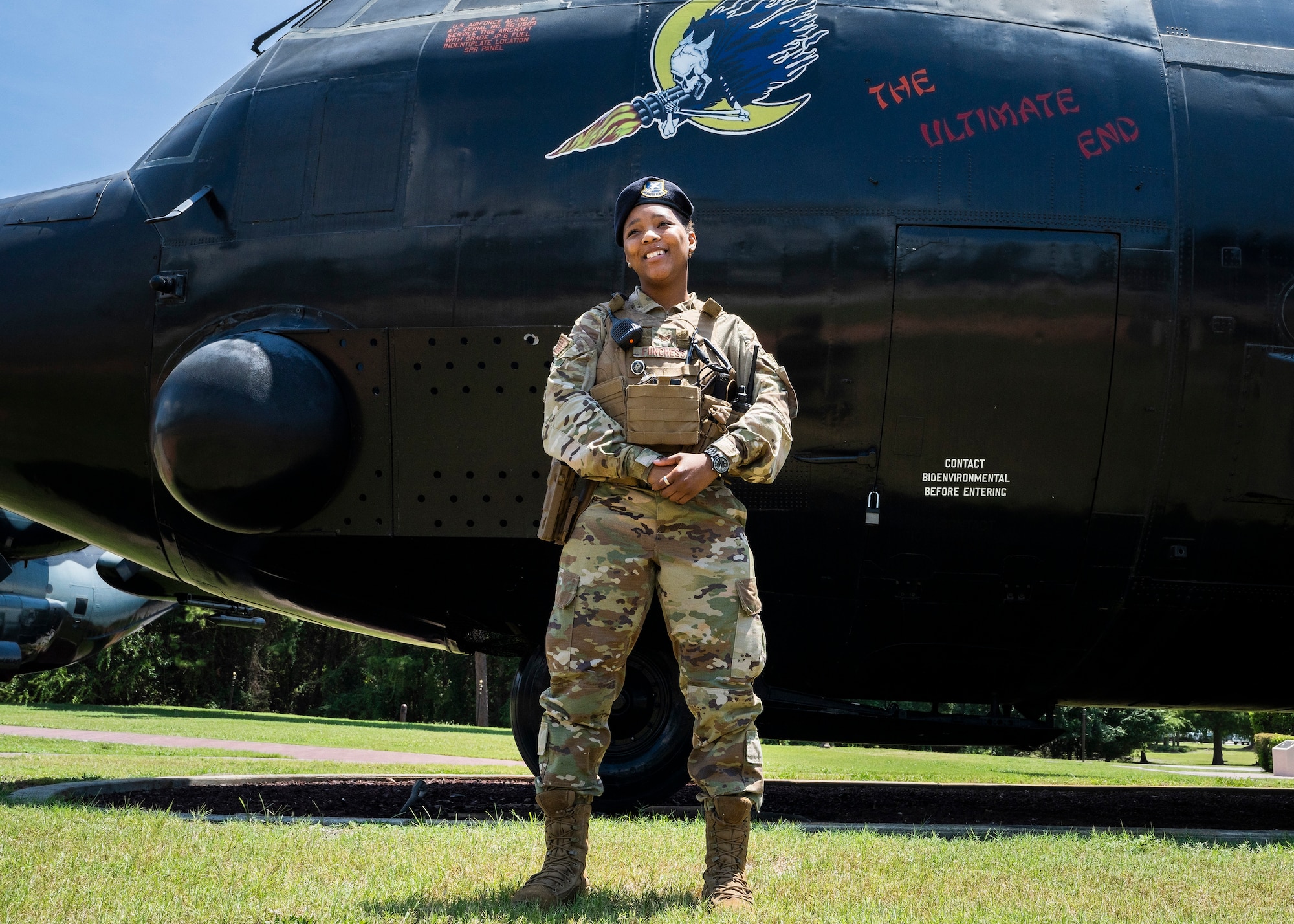 Photo of Airman standing in front of an AC-130