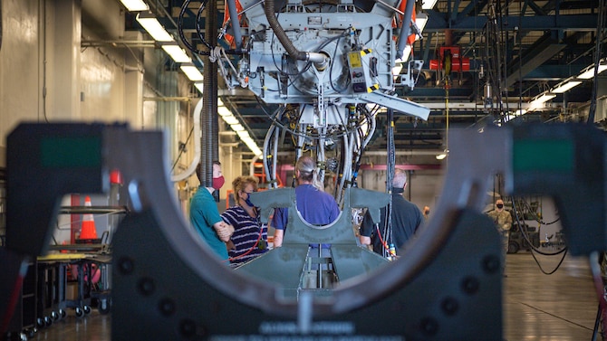 Sandia National Laboratories aircraft compatibility department B-52H Stratofortress electrical team members prepare testing equipment during an Aircraft Monitor and Control test for the B-52H at Barksdale Air Force Base, La., Aug. 24, 2020. The test is performed every five to ten years to demonstrate the capability of the B-52 to provide the required voltage levels for the mission configuration in the AGM-86 air-launched cruise missile interface. (U.S. Air Force photo by Senior Airman Lillian Miller)