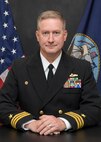 Cmdr. Joseph Libasci, prospective commanding officer of the Arleigh Burke-class guided-missile destroyer, poses for a studio portrait.