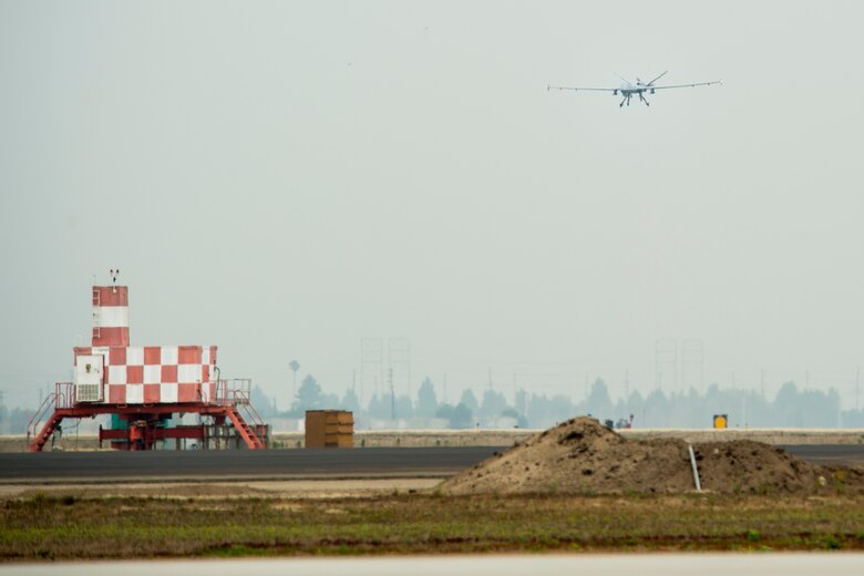 A MQ-9 Reaper approaches the runway during Exercise Agile Reaper Sept. 12, 2020, at Naval Air Station Point Mugu, California. The routine training exercise focuses on rapidly positioning MQ-9s into unfamiliar airfields, relaunching and creating combat effects before detection and targeting. (U.S. Air Force photo by Senior Airman Collette Brooks)