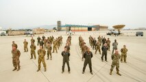 Participants of Exercise Agile Reaper pose for a photo Sept. 12, 2020, at Naval Air Station Point Mugu, California. The routine training exercise focused on rapid deployment of multiple MQ-9s to any location using minimal personnel, fuel and equipment and reducing deployment timelines from weeks to hours. (U.S. Air Force photo by Senior Airman Collette Brooks)