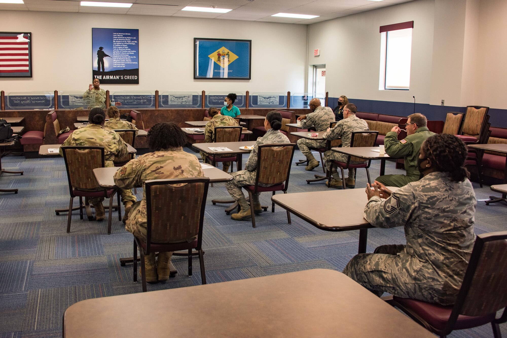 Airmen listen to introductory remarks by CMSgt Robbin Moore at her first monthly “Chat n Chew” roundtable, August 27, 2020 at New Castle Air National Guard Base, Del. This was CMSgt Moore’s first monthly “Chat n Chew” event for 166th Airlift Wing NCOs. (USAF photo by Mr. Mitch Topal)
