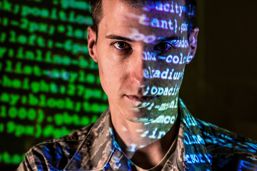 Airman works on computers